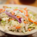 Small bowl of coleslaw on a plate
