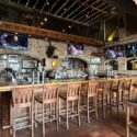 Sports bar with four flat screen TVs at Nick's in OCMD